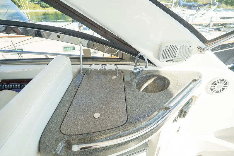  Yacht Photos Pics Luxurious 2009 Regal Commodore 4060 yacht interior with sleek countertop and sink.