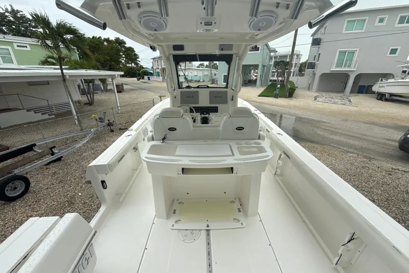  Yacht Photos Pics 2016 Everglades 295 Center Console boat interior with helm and seating area.