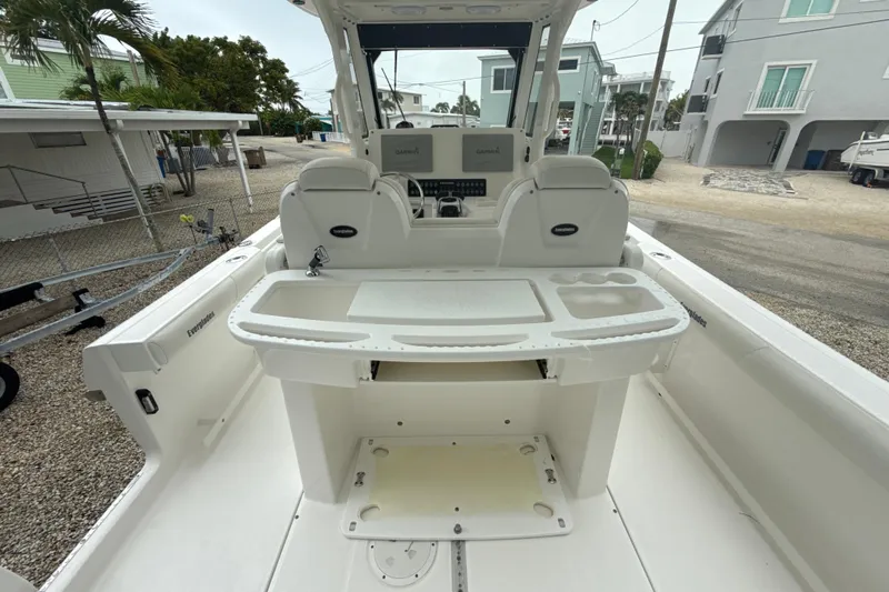  Yacht Photos Pics 2016 Everglades 295 Center Console boat interior with helm and seating area.