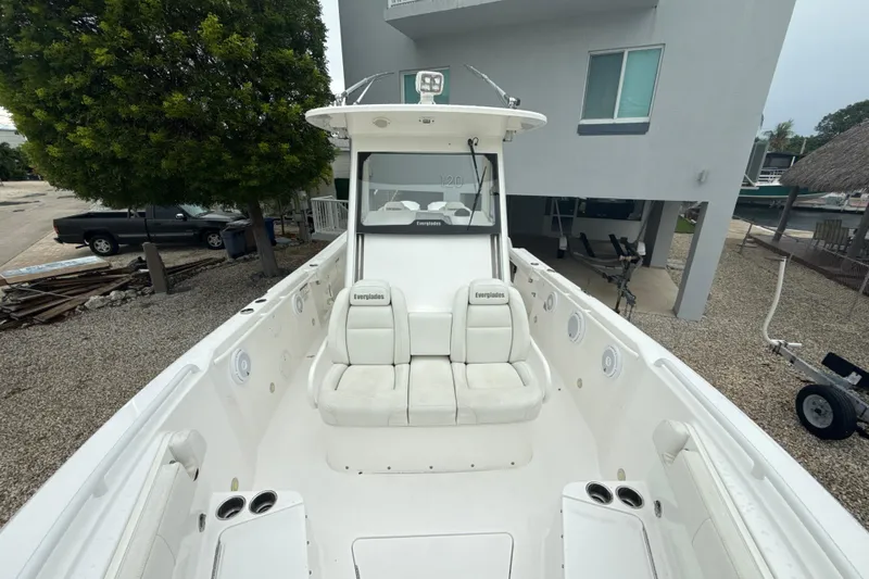  Yacht Photos Pics 2016 Everglades 295 Center Console boat with white seating and spacious deck.