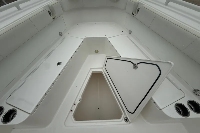  Yacht Photos Pics 2016 Everglades 295 Center Console boat interior with open storage compartment.