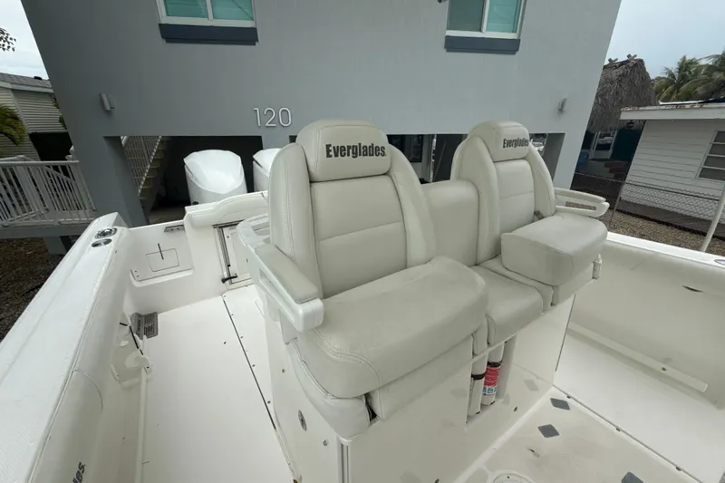  Yacht Photos Pics 2016 Everglades 295 Center Console boat with dual white seats and branded upholstery.