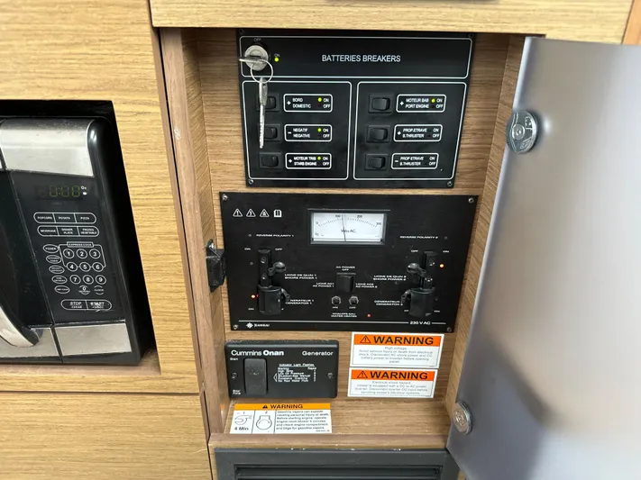 Andalucia Yacht Photos Pics Electrical panel of 2017 Jeanneau NC 11 boat with battery breakers and controls.