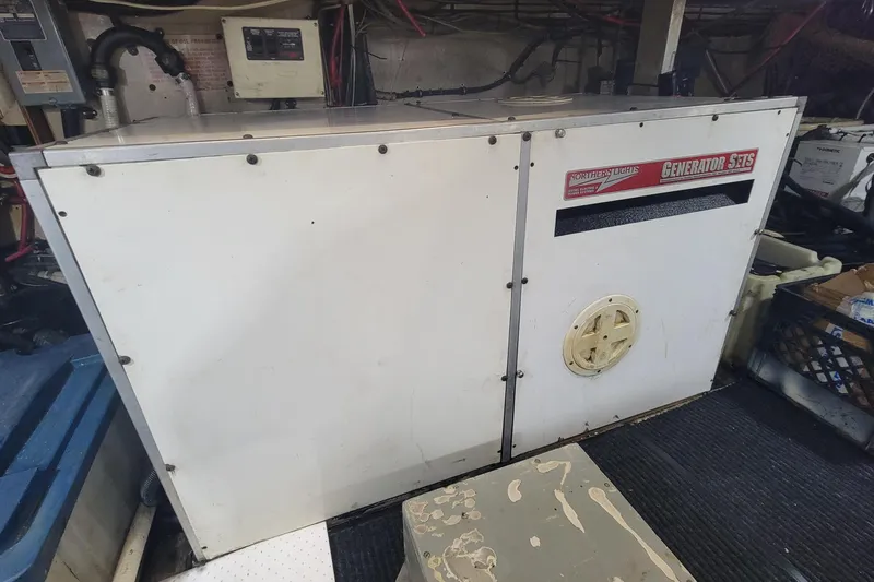 'elixir' Yacht Photos Pics Engine room of 1982 Hatteras 56 Wide Body yacht with generator.
