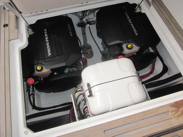  Yacht Photos Pics Engine compartment of 2019 Jeanneau NC 33 with dual Volvo Penta engines.
