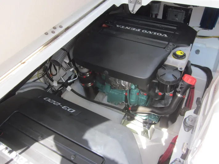  Yacht Photos Pics Engine compartment of a 2019 Jeanneau NC 33 with Volvo Penta D3-220 engine.