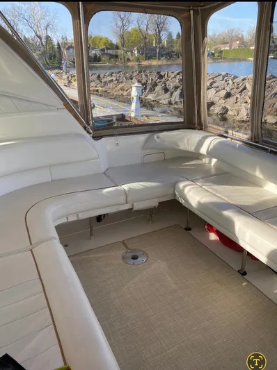  Yacht Photos Pics 1998 Sea Ray 400 Sundancer interior with white seating and scenic water view.