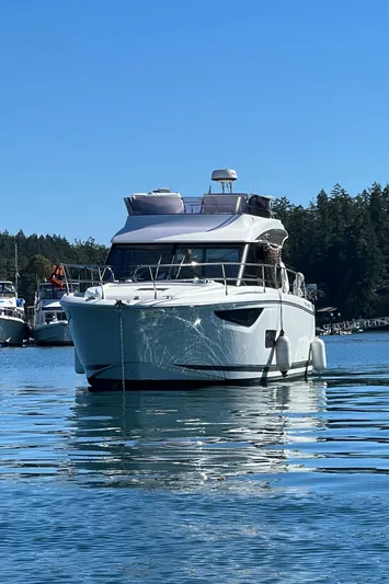  Yacht Photos Pics 2019 Jeanneau Velasco 37F yacht cruising on calm waters.