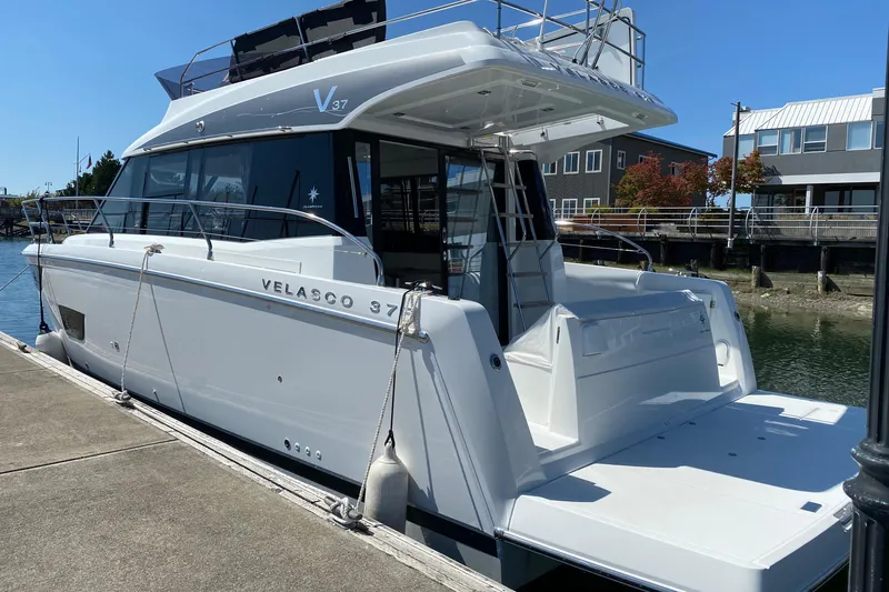  Yacht Photos Pics 2019 Jeanneau Velasco 37F yacht docked at marina.