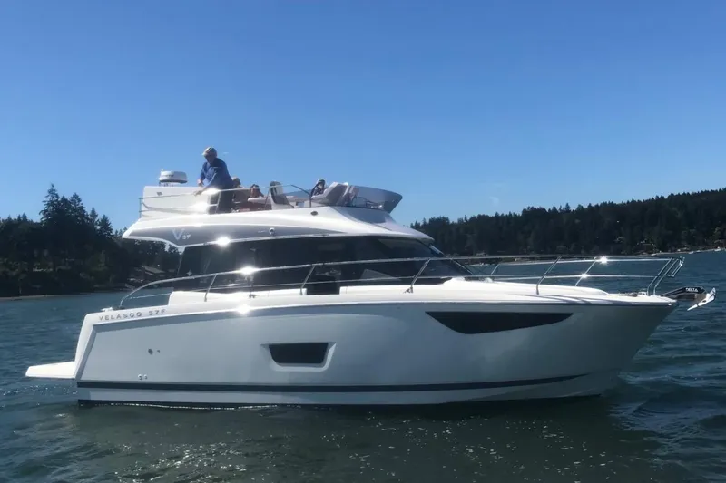  Yacht Photos Pics 2019 Jeanneau Velasco 37F yacht cruising on a sunny day.
