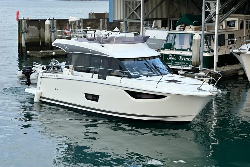  Yacht Photos Pics 2019 Jeanneau Velasco 37F yacht docked at marina.