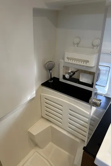  Yacht Photos Pics Interior of 2019 Jeanneau Velasco 37F yacht bathroom with modern fixtures.