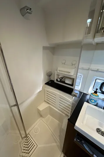  Yacht Photos Pics 2019 Jeanneau Velasco 37F yacht bathroom with modern fixtures and compact design.