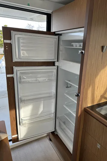  Yacht Photos Pics Open refrigerator in 2019 Jeanneau Velasco 37F yacht kitchen.