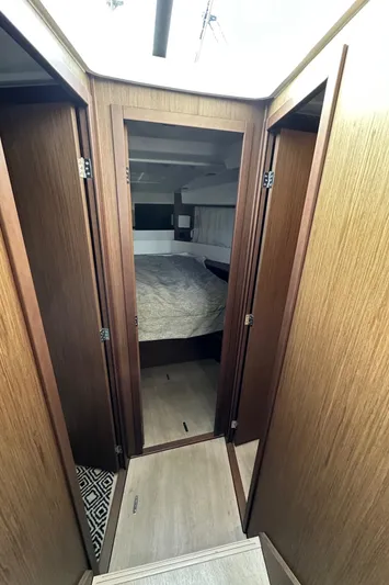 Yacht Photos Pics Interior of 2019 Jeanneau Velasco 37F yacht, featuring a cozy bedroom.