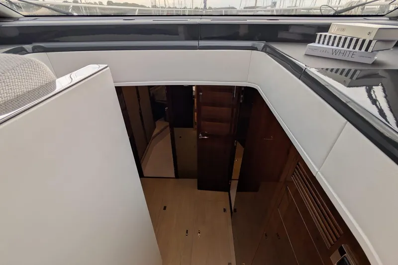 Tender Garage & Hi/lo Swimplatform Yacht Photos Pics Interior view of 2022 Fairline Targa 45 GT yacht, featuring modern design and wood finishes.