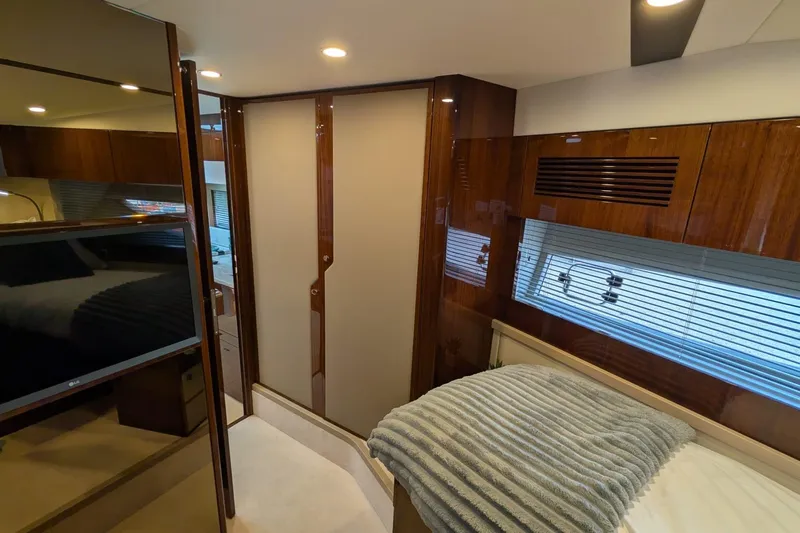 Tender Garage & Hi/lo Swimplatform Yacht Photos Pics Luxurious interior of 2022 Fairline Targa 45 GT yacht with modern wood finishes.