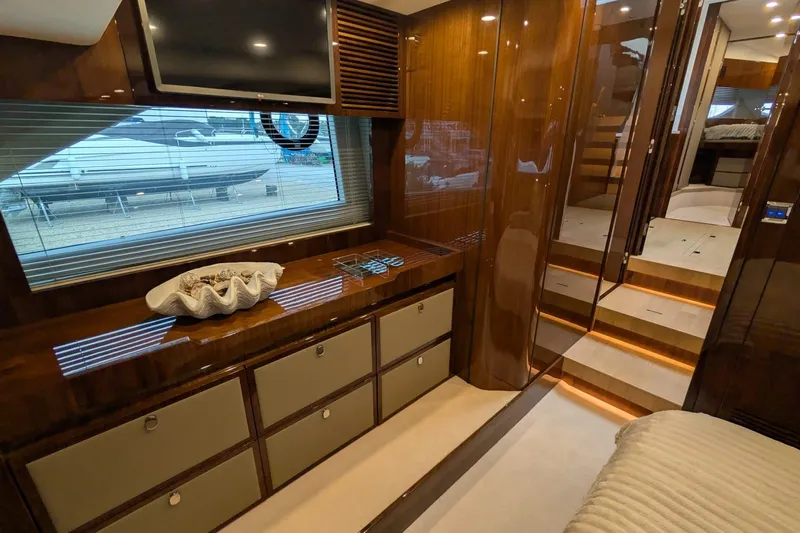 Tender Garage & Hi/lo Swimplatform Yacht Photos Pics Luxurious interior of 2022 Fairline Targa 45 GT yacht with elegant wood finishes.