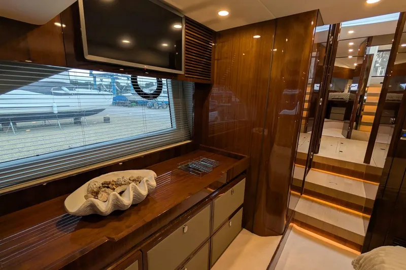 Tender Garage & Hi/lo Swimplatform Yacht Photos Pics Luxurious interior of 2022 Fairline Targa 45 GT yacht with elegant wood finishes.