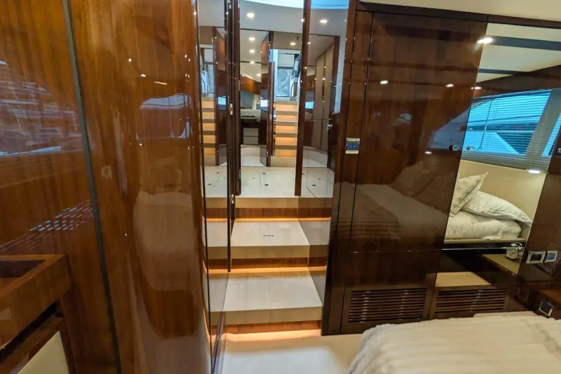 Tender Garage & Hi/lo Swimplatform Yacht Photos Pics Luxurious interior of 2022 Fairline Targa 45 GT yacht with polished wood finishes.