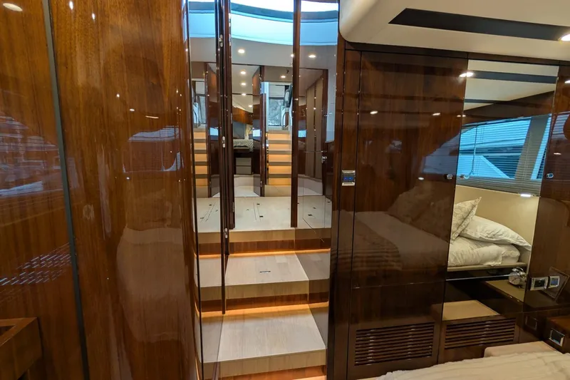 Tender Garage & Hi/lo Swimplatform Yacht Photos Pics Luxurious interior of 2022 Fairline Targa 45 GT yacht with polished wood finishes.
