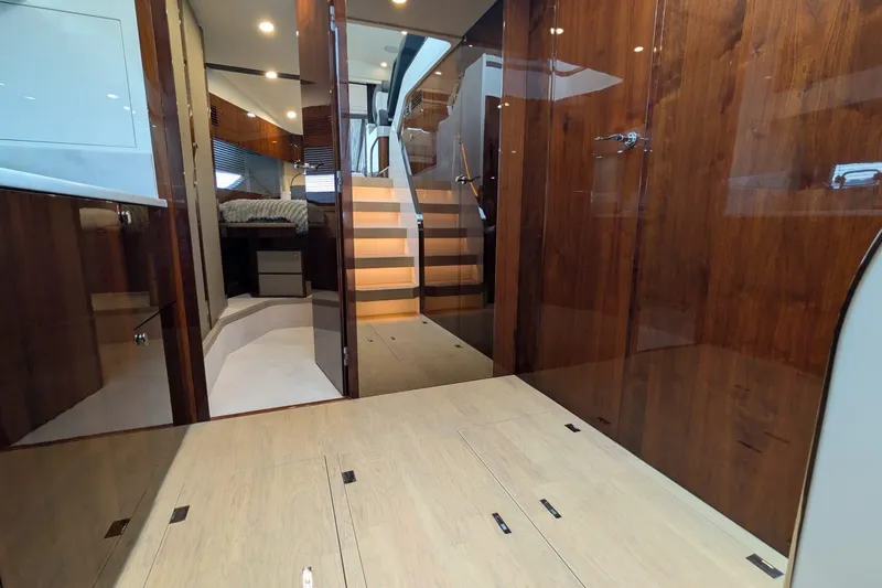Tender Garage & Hi/lo Swimplatform Yacht Photos Pics Luxurious interior of 2022 Fairline Targa 45 GT yacht with wooden finishes and modern design.