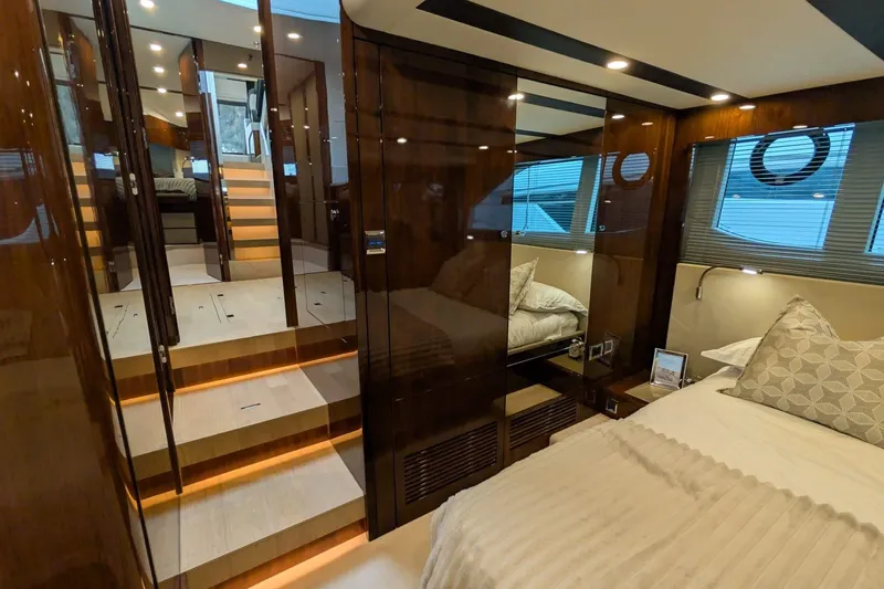 Tender Garage & Hi/lo Swimplatform Yacht Photos Pics Luxurious interior of 2022 Fairline Targa 45 GT yacht with elegant wood finishes.