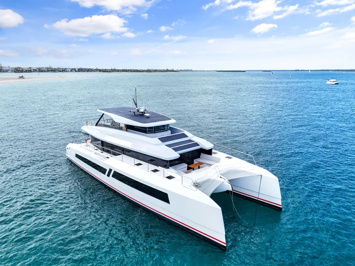 Bundalong Yacht Photos Pics Luxury 2023 McConaghy MC 82P yacht on serene blue ocean under clear sky.
