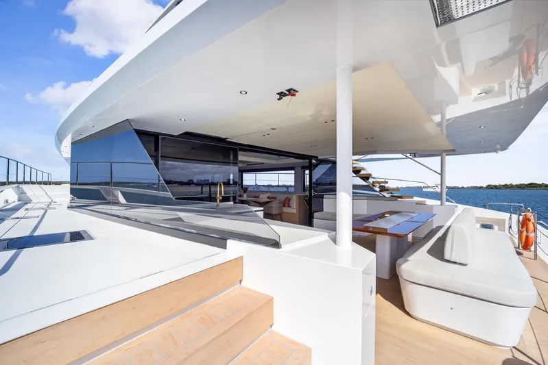 Bundalong Yacht Photos Pics Luxurious 2023 McConaghy MC 82P yacht deck with modern seating and ocean view.
