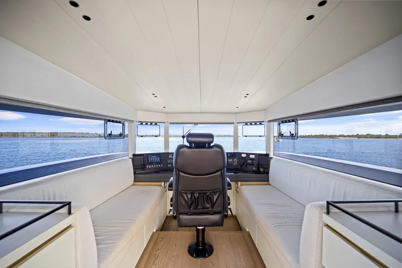 Bundalong Yacht Photos Pics Interior of 2023 McConaghy MC 82P yacht, featuring helm and panoramic windows.