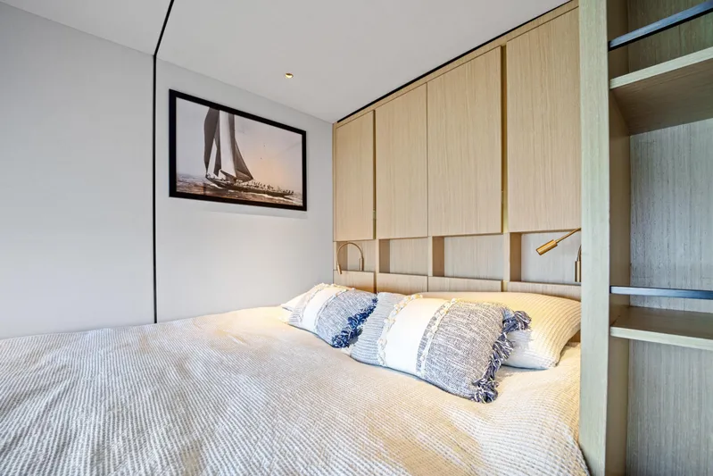 Bundalong Yacht Photos Pics Luxurious bedroom interior on McConaghy MC 82P yacht, 2023 model, featuring elegant decor.