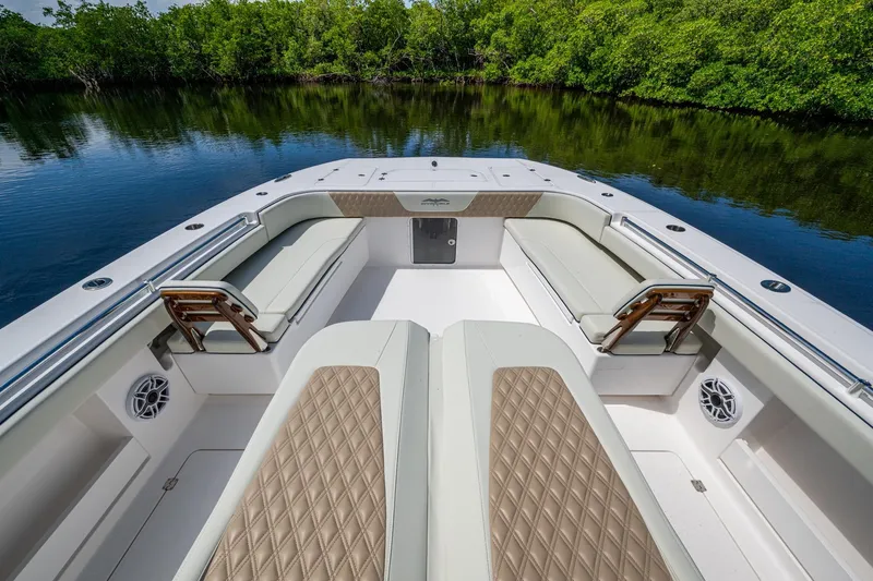 Gotta Go Yacht Photos Pics 2025 Invincible 37 Catamaran interior with luxurious seating and scenic water view.