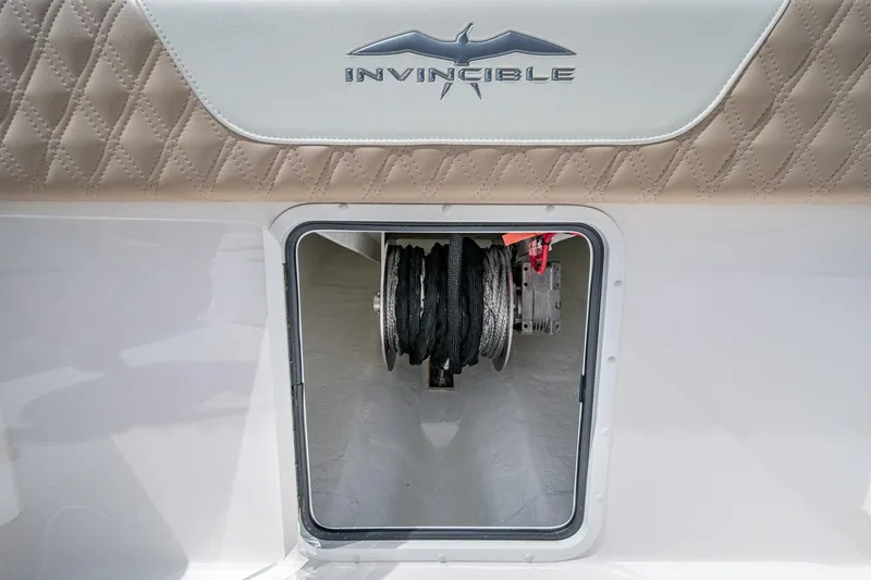 Gotta Go Yacht Photos Pics 2025 Invincible 37 Catamaran anchor storage with logo and quilted upholstery.