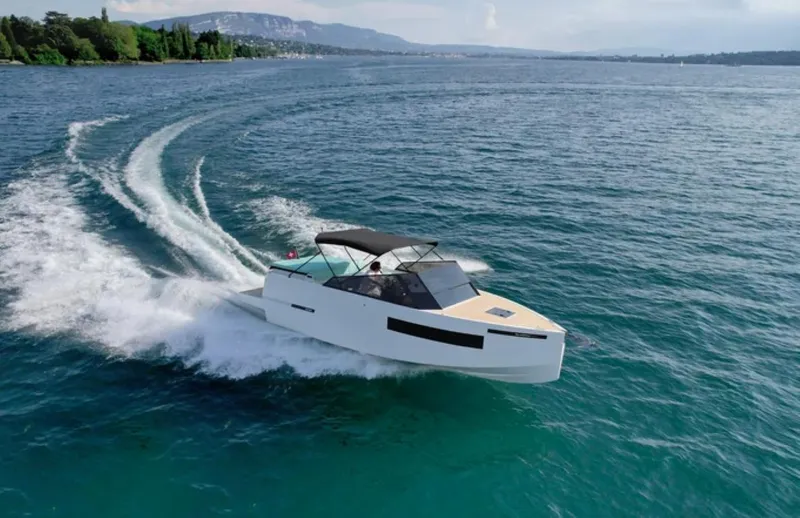  Yacht Photos Pics 2024 De Antonio Yachts D28 Cruiser speeding on open water.