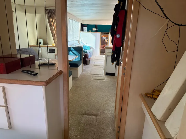 Lexy Lu Yacht Photos Pics Interior of 1996 Bluewater Yachts 52 Limited Edition, featuring cozy living space and modern amenities.