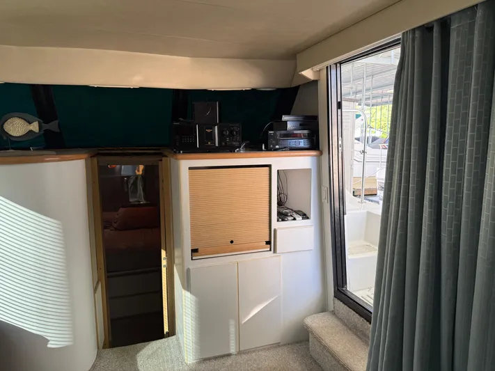 Lexy Lu Yacht Photos Pics Interior of 1996 Bluewater Yachts 52 Limited Edition with modern amenities and large window.