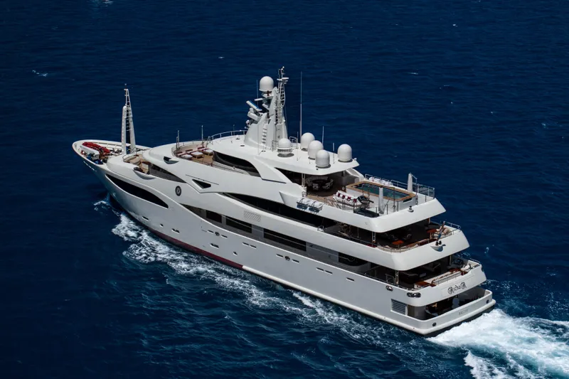 Richar Yacht Photos Pics Luxurious 2008 CRN 185 yacht cruising on open blue sea.