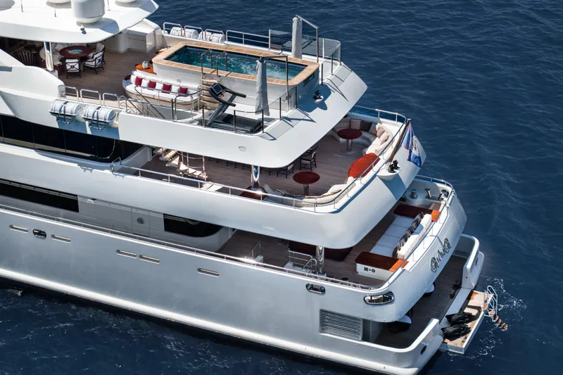 Richar Yacht Photos Pics Luxurious 2008 CRN 185 yacht with pool and multiple decks on open sea.