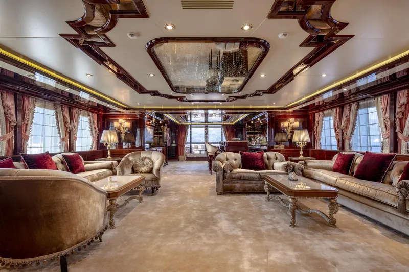 Richar Yacht Photos Pics Luxurious yacht interior with elegant sofas, ornate ceiling, and rich wood accents, CRN 185, 2008.