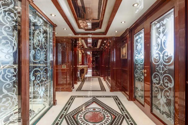 Richar Yacht Photos Pics Luxurious yacht interior with ornate wood paneling and decorative glass doors, CRN 185, 2008 model.