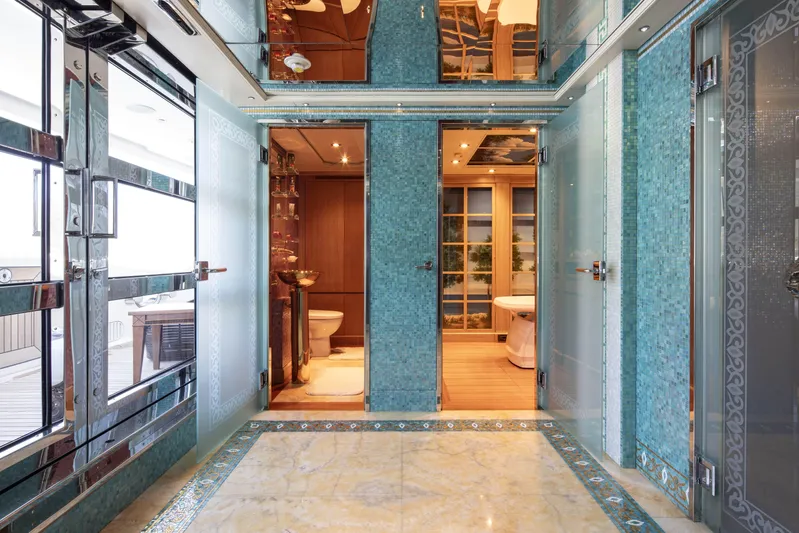 Richar Yacht Photos Pics Luxurious yacht interior with elegant bathroom, marble flooring, and mirrored walls, CRN 185, 2008 model.