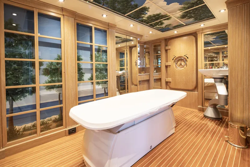 Richar Yacht Photos Pics Luxurious spa room on 2008 CRN 185 yacht with elegant wood paneling and serene decor.