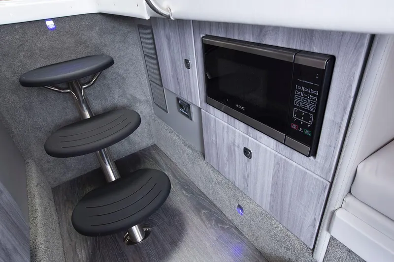 330cbr Yacht Photos Pics Manufacturer Provided Image: 2025 Formula 330 Crossover Bowrider I/O interior with microwave and modern steps.