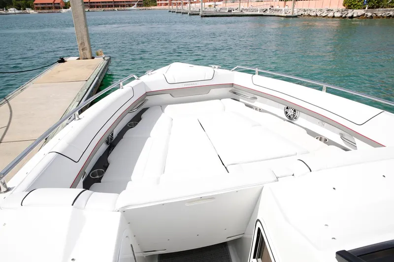  Yacht Photos Pics Manufacturer Provided Image: 2021 Formula 330 Crossover Bowrider I/O, spacious bow seating area, docked by the water.