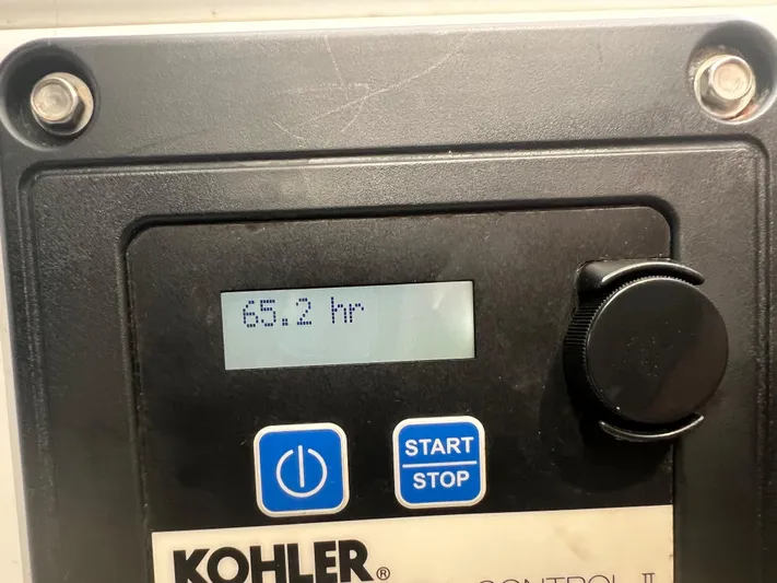 Knot A Care Yacht Photos Pics Kohler control panel displaying 68.2 hours on a 2015 Cruisers Yachts 350 Express.