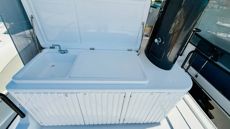  Yacht Photos Pics Outdoor sink and counter on 2025 Azimut Magellano 60 yacht deck.