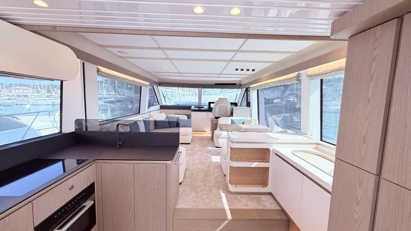  Yacht Photos Pics Luxurious interior of 2025 Azimut Magellano 60 yacht with modern design and panoramic windows.