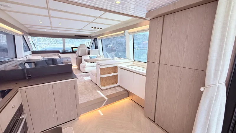  Yacht Photos Pics Luxurious interior of 2025 Azimut Magellano 60 yacht with modern design and spacious layout.