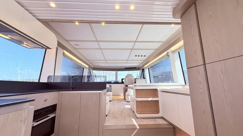  Yacht Photos Pics Luxurious interior of 2025 Azimut Magellano 60 yacht with modern design and spacious layout.
