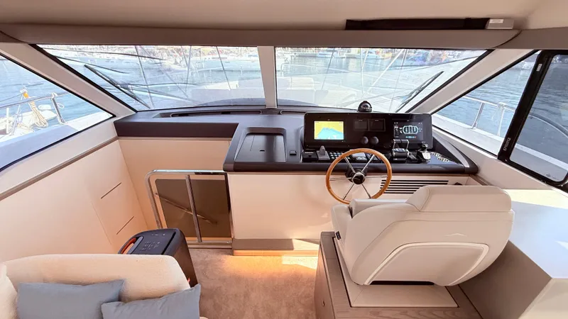  Yacht Photos Pics Luxurious helm of 2025 Azimut Magellano 60 yacht with modern navigation systems.
